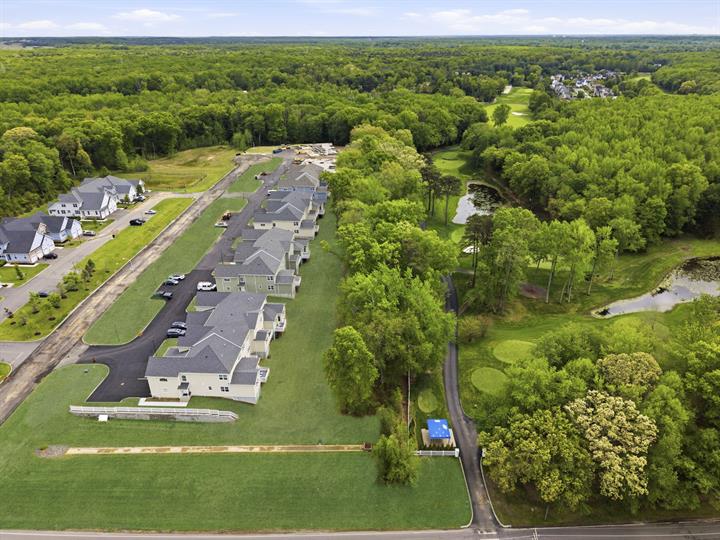 Aerial view along Remington Court beside the course