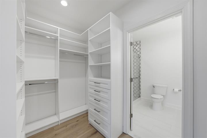 Walk-in closet with custom shelving