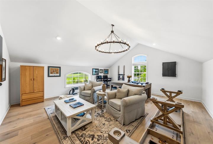 Vaulted bonus room: Second-floor space finished for family and games