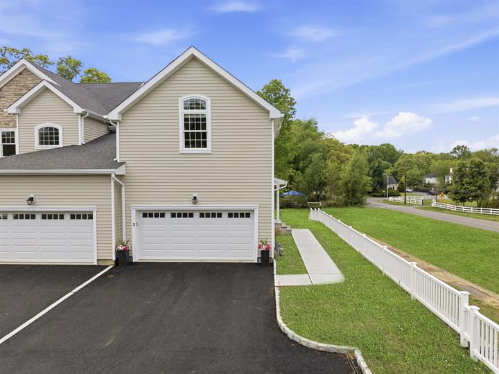 End-unit exterior and two-car garage