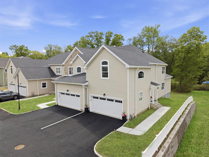 Townhome front exterior in summer