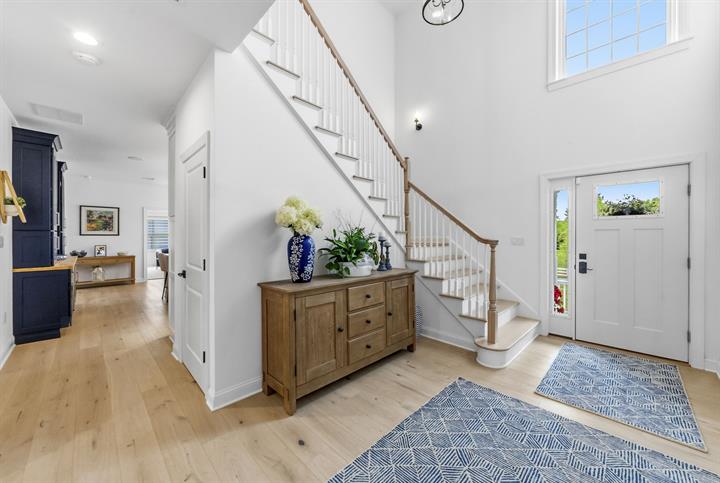 Two-story foyer with staircase